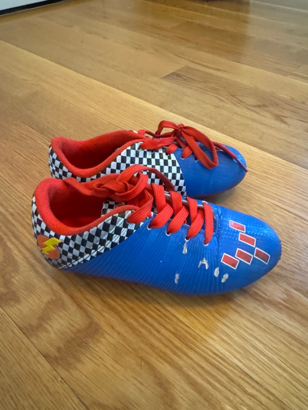 Kids Blue and Red Racing Soccer Cleats